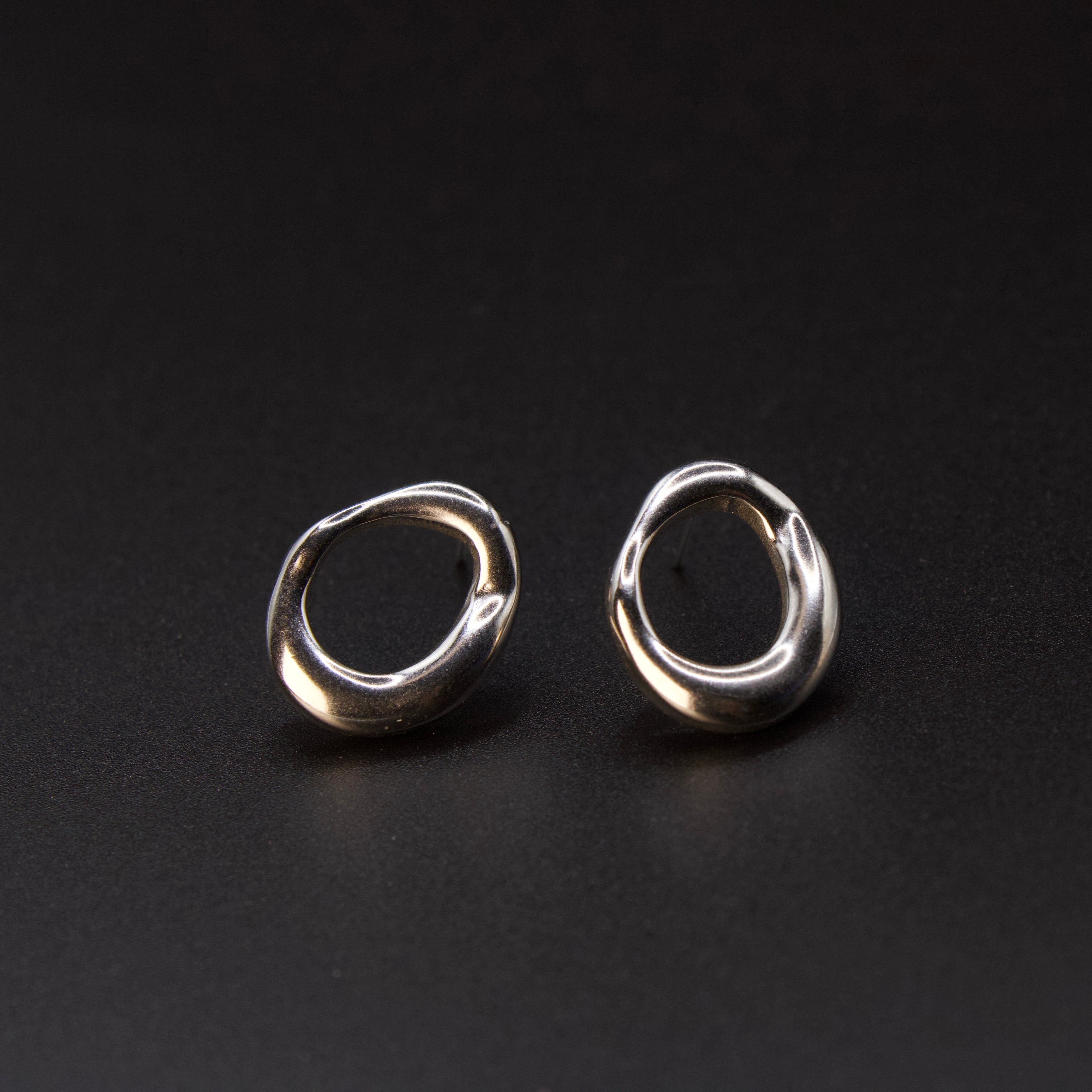 Molten orbit earrings