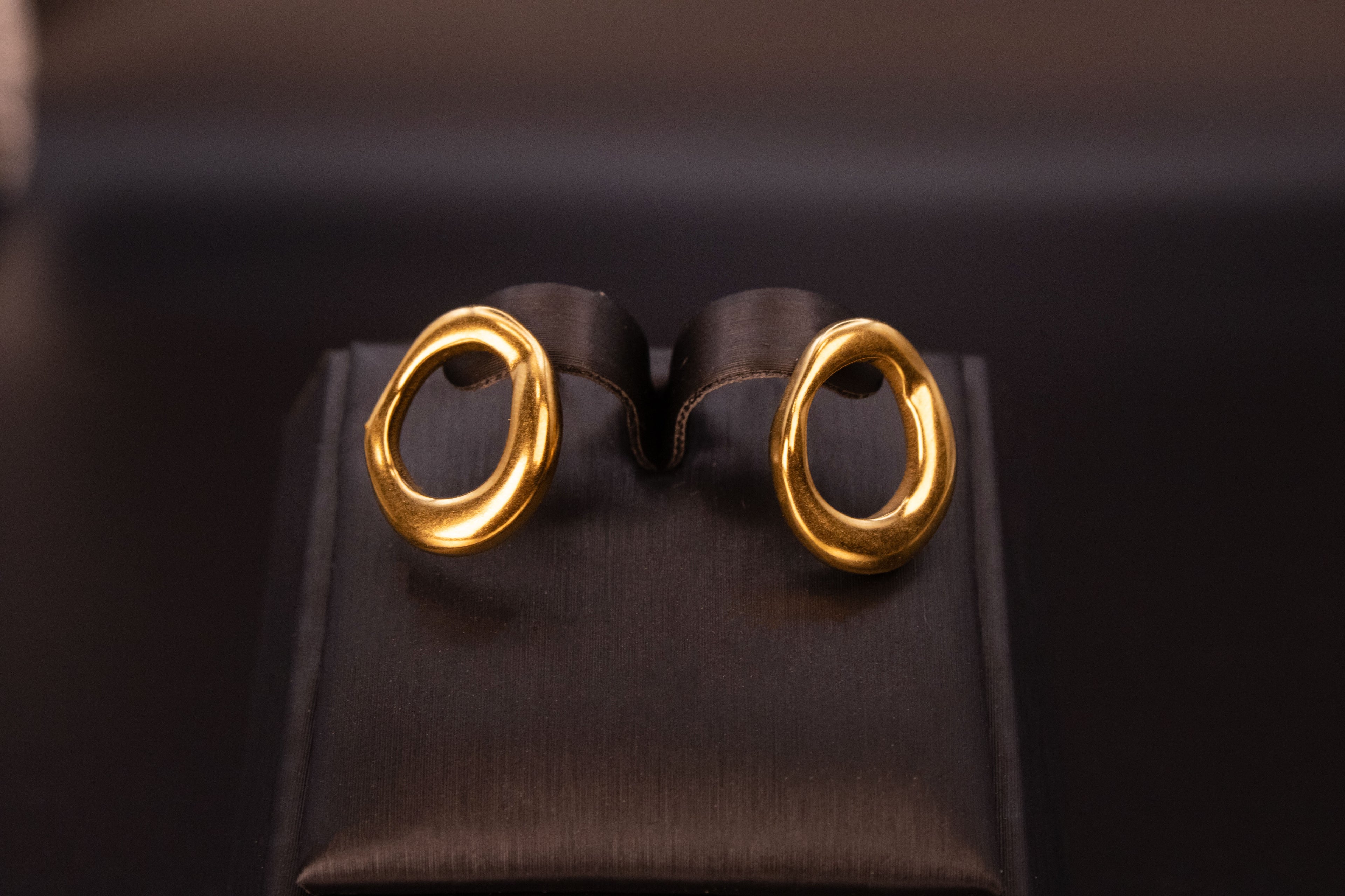 Molten orbit earrings